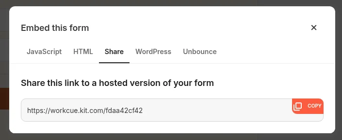 Kit Embed this form dialog on the Share tab with JavaScript, HTML, Share, WordPress and Unbounce tabs and the link https://workcue.kit.com/fdaa42cf42