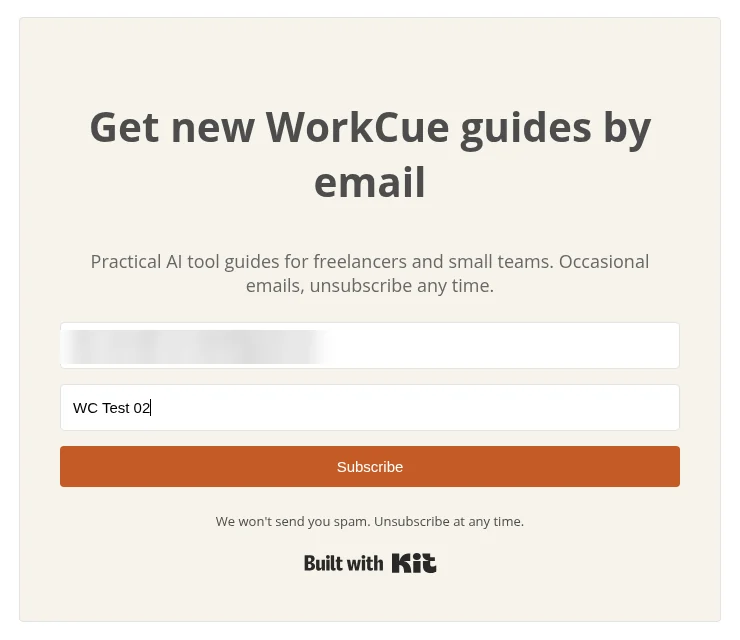 The hosted WorkCue form at workcue.kit.com filled in with a blurred test email address and the first name WC Test 02
